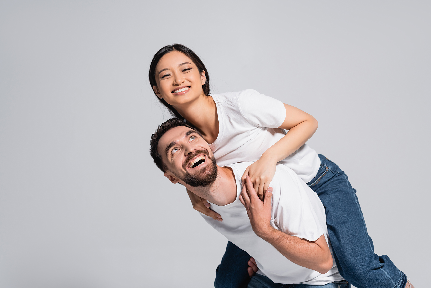 Excited man piggybacking his partner